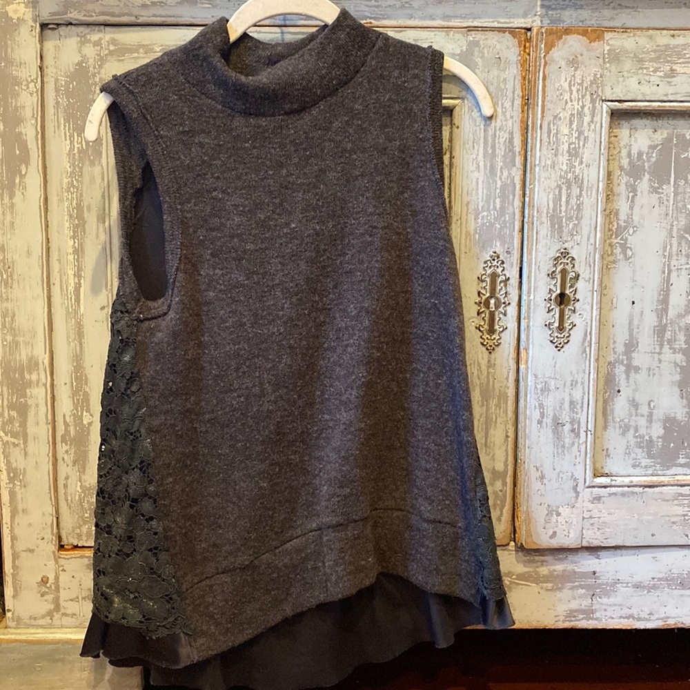 grey wool top with lace patterned back, sleeveless
